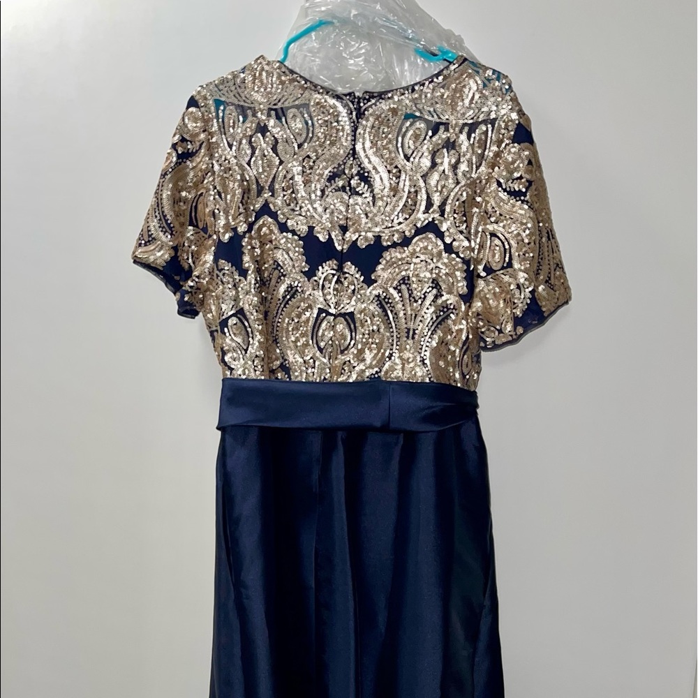 2 long formal dresses plus sz. 20w blue & sz. 24 wine. Both w/ Deep Pockets